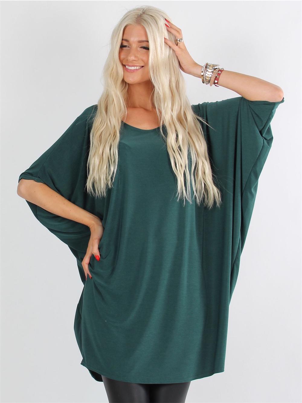 Rimini - Elastisk klänning med fladdermusärmar